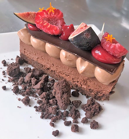 chocolate dessert with fruit on top