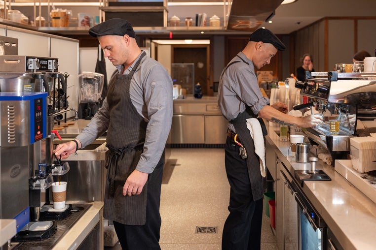 (L-R) Shawn Tarnawa &amp; Dorlo Lhaso swiftly and efficiently accommodate a constant stream of customers at The Elm.