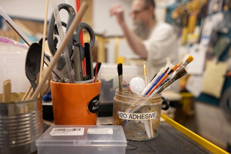 Various brushes Schrader uses to create props.
