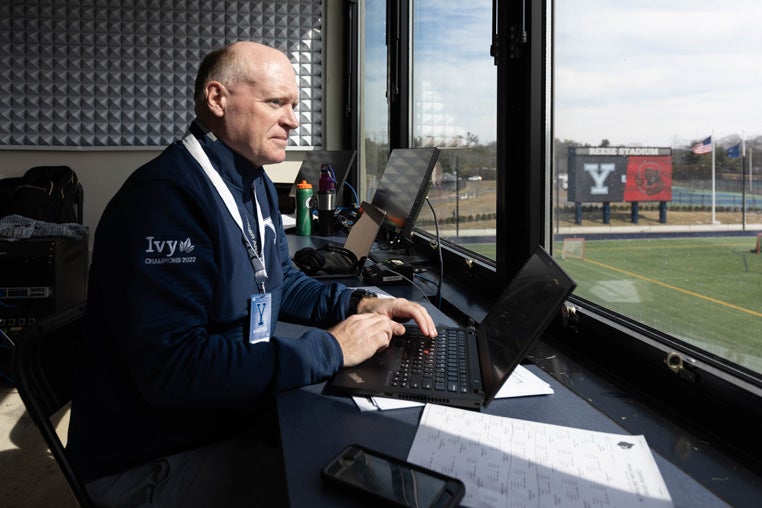 Tim Bennett watches the field from the press box