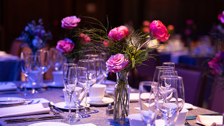 Beautifully decorated tables evoke the spirit of celebration in Commons Dining Hall at the Schwarzman Center.