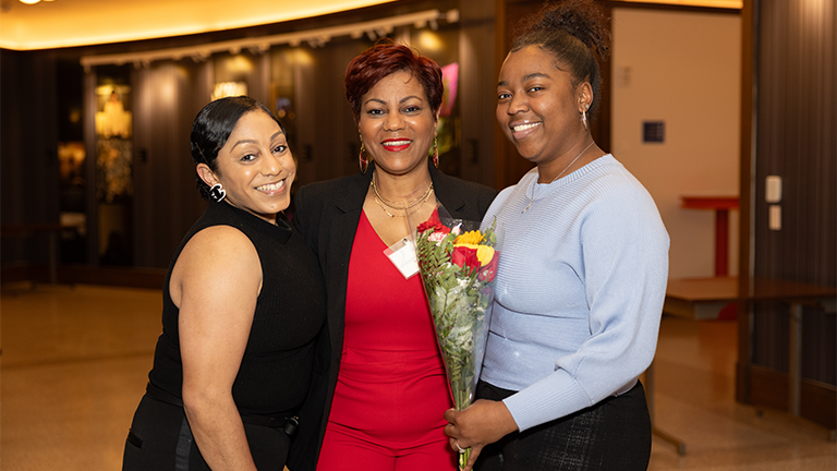 Terry Reese celebrates her 25-year milestone with loved ones.