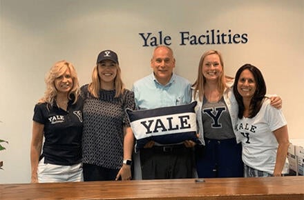 HR Support team celebrates Staff Spirit week with their Yale SWAG