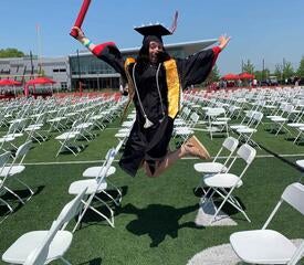 Donna Alchimio, Office of Undergraduate Admissions, also jumped for joy when daughter Alyssa graduated cum laude from Sacred Heart University with a B.S. in Psychology.