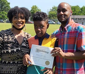 Nadine Williams, VST, says, “I am so proud to say my grandson has graduated from 5th grade. He will be attending Benhaven School. He is featured with his proud parents! Hugs and kisses to Reegan, love his Yai- Yai”