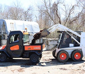 Loading mulch for spreading at West Campus - Photo by Ronnie Rysz