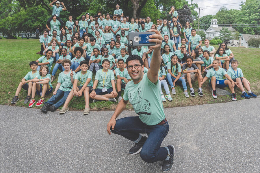 Person taking a selfie with the Morse Summer Academy participants.